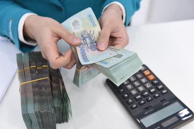 Nhiều ngân hàng lớn tiếp tục giảm lãi suất tiền gửi - Ảnh 1. Nhiều ngân hàng lớn tiếp tục giảm lãi suất tiền gửi - Ảnh 1.
